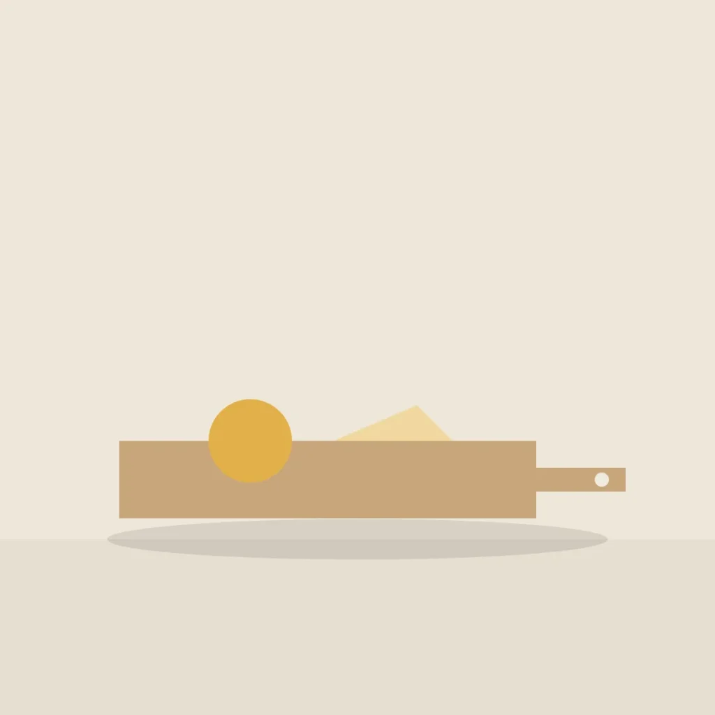 Wooden serving board with cheese and an orange