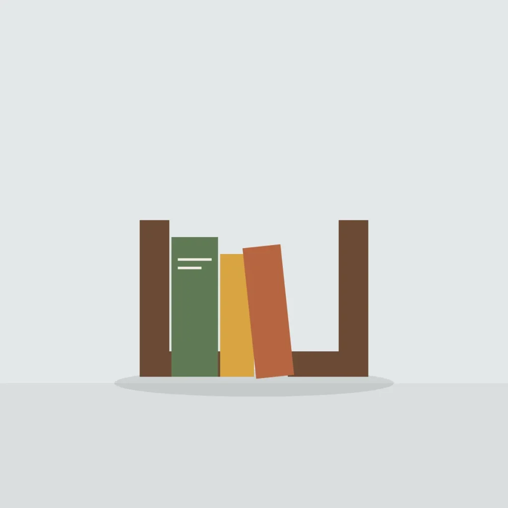Pair of walnut bookends holding three cloth-bound books