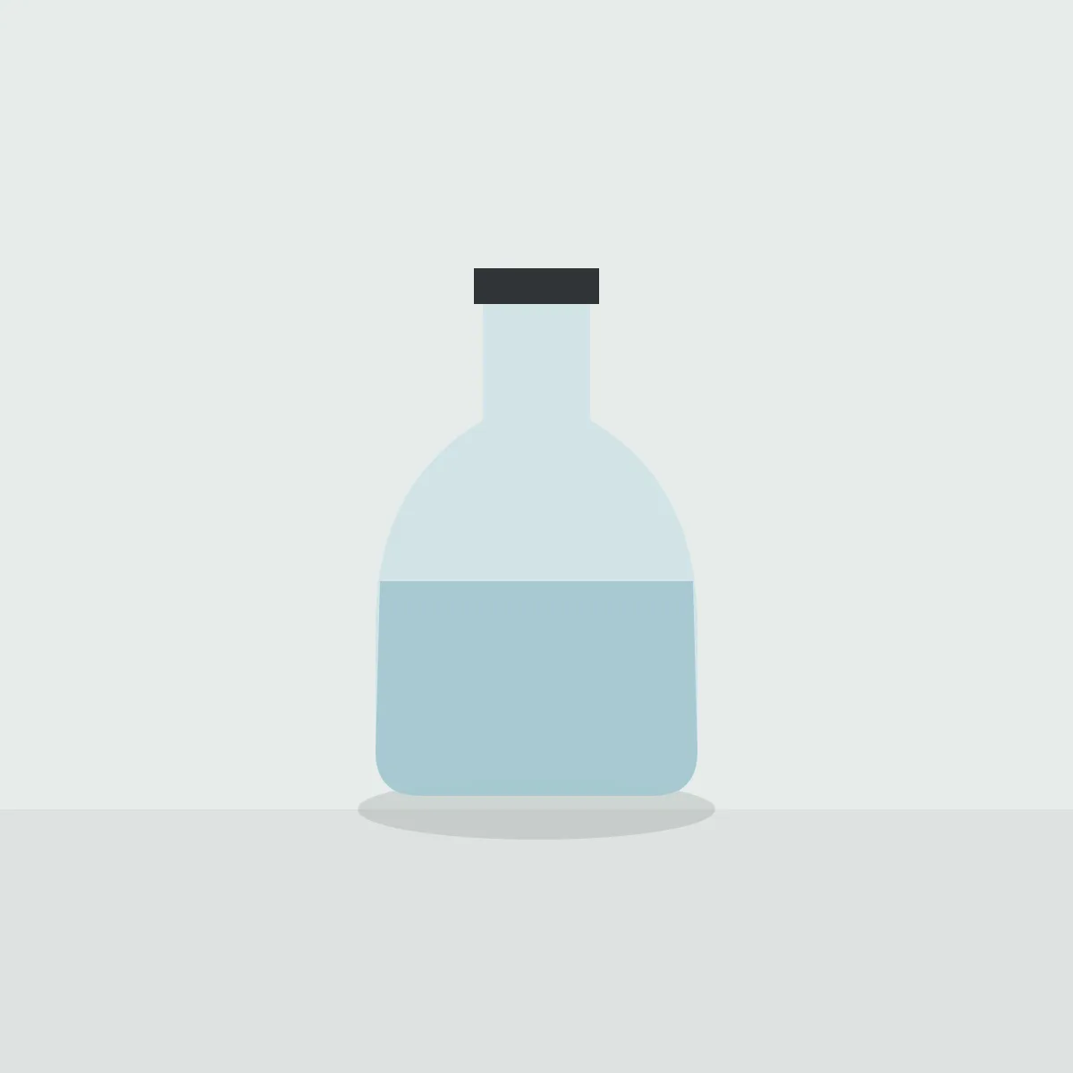 Clear glass carafe half filled with water