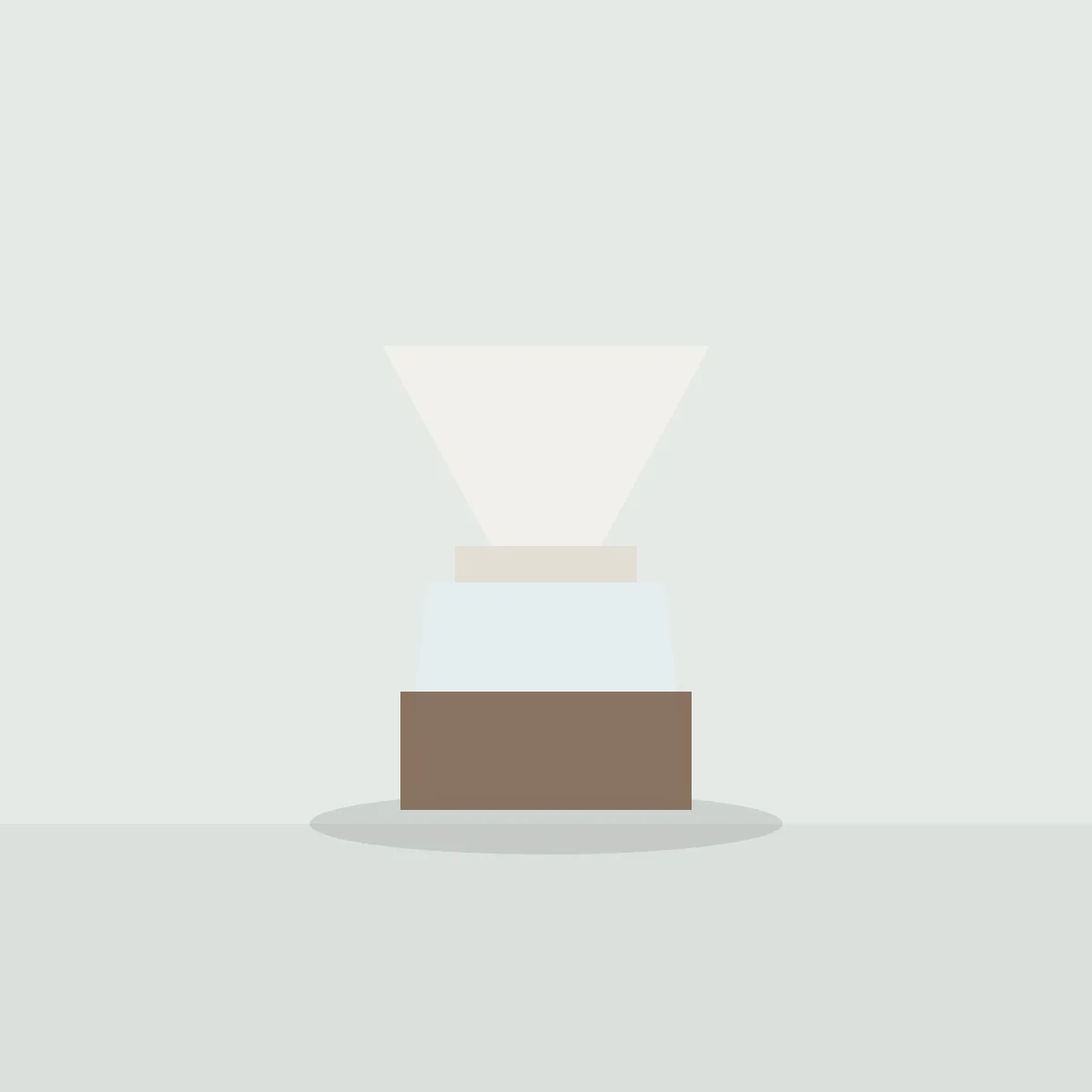 White porcelain dripper on a glass coffee server